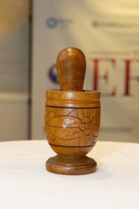 Carved with flowers, built for flavor— the heartbeat of the Haitian kitchen